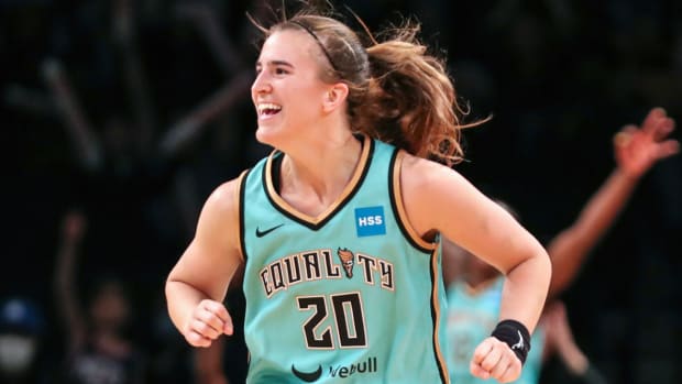 Liberty guard Sabrina Ionescu celebrates during a game in 2022.